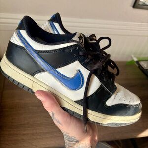 Nike Men's Black and White Sneakers with Blue Accents